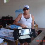 Dr. Dave David Holds Medical Equipment in Sri Lanka