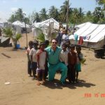 Dr. Dave David poses with survivors of the Sri Lanka Tsunami